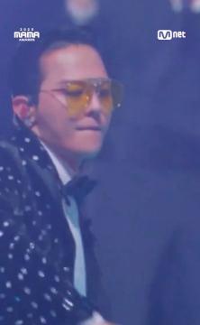 G-Dragon’s Thumbs-Down Comment on MAMA Performance Video Fuels Fan Speculation