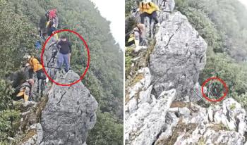 try to take a selfie... Tourists Fall 15m at the Top of the Mountain, Survive Miraculously